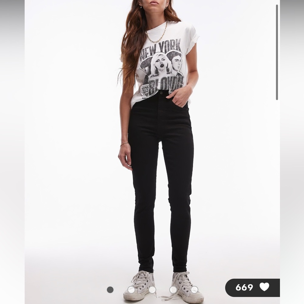 Top shop “Jamie” high rise skinny jeans. Black. Size 10 with distressed knees.